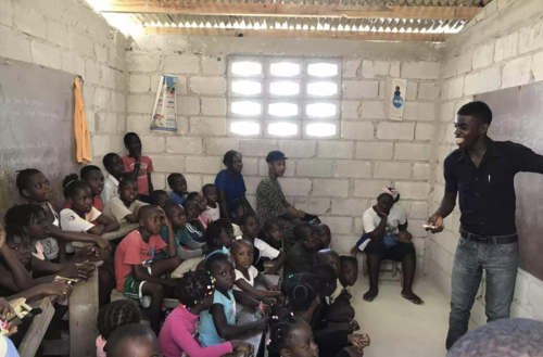 The Shoe That Grows to students in Haiti