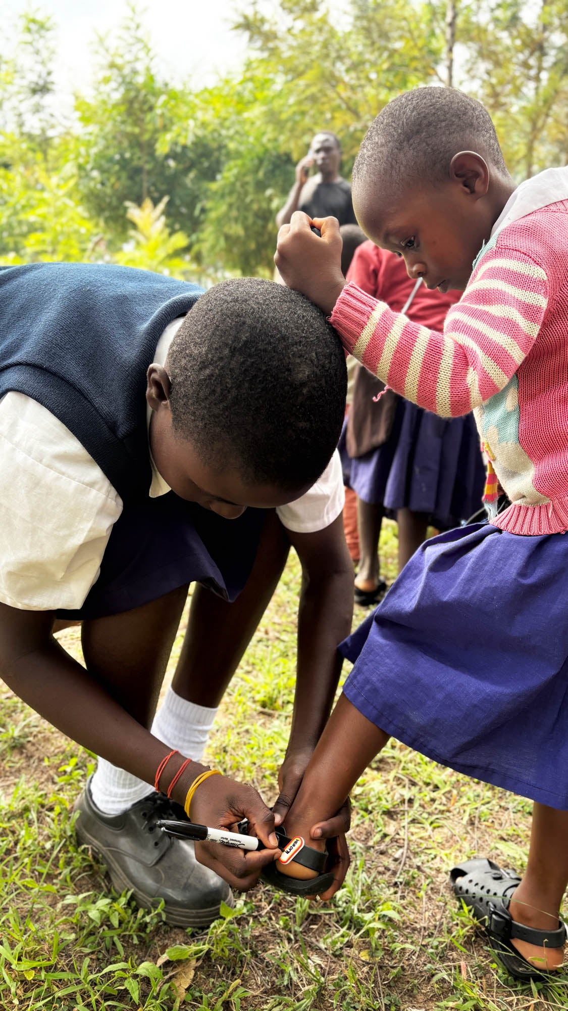 Donor_trip_2025_-_students_shoes_2.jpg